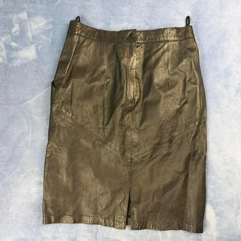 Vintage leather midi skirt with slit and‎ pockets. Women Size: 42